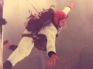 A photograph of Carol skydiving.